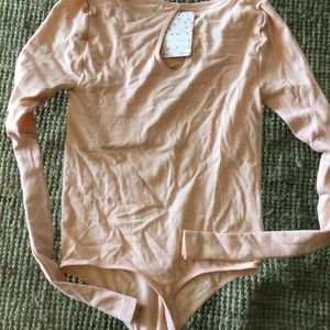 NEW! Free People creamy peach ribbed bodysuit